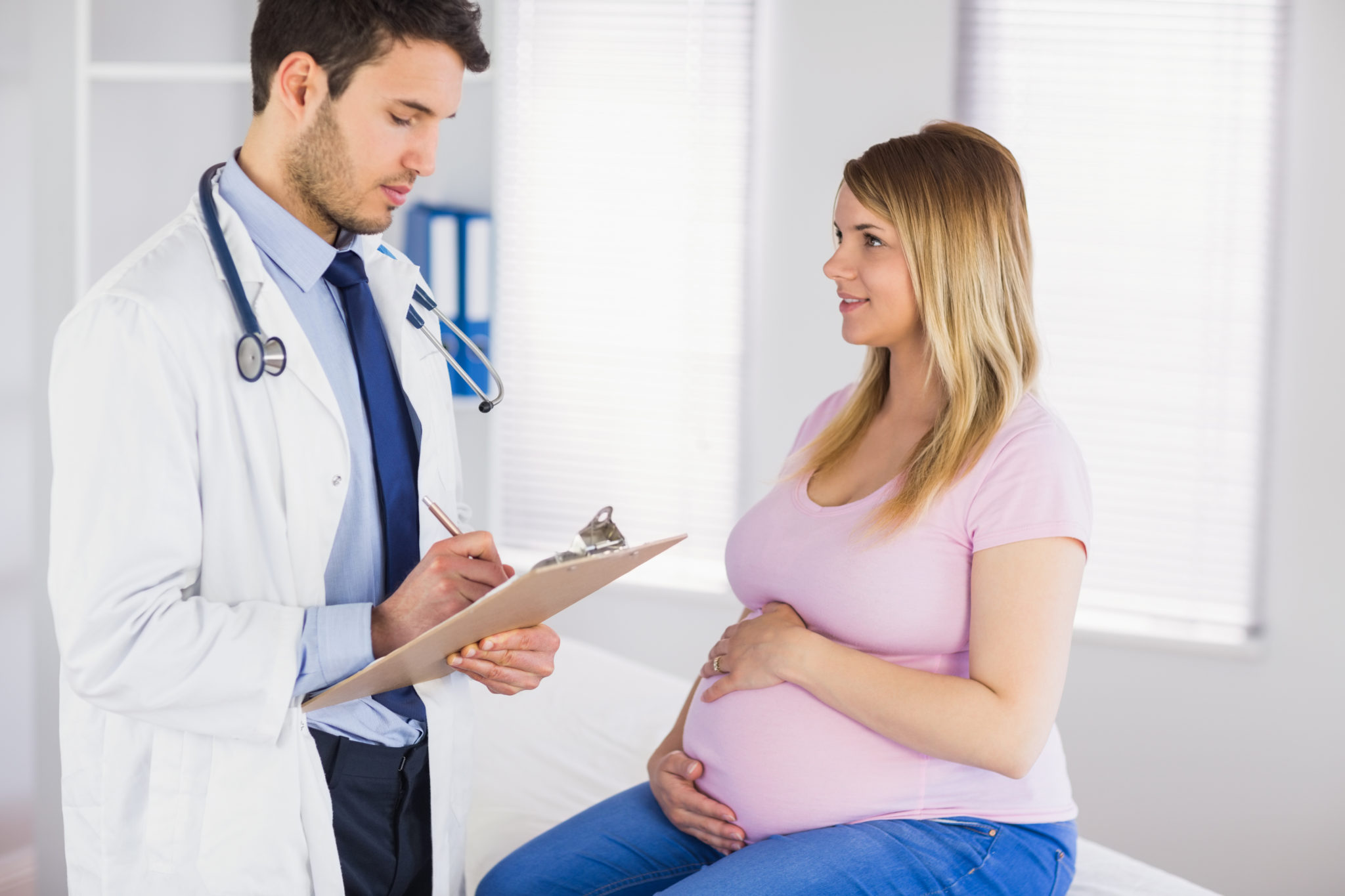 Pregnant White Woman And Her Cute Male Doctor Worklife Law 