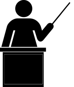 A clip art image of a female at a podium holding a pointer.