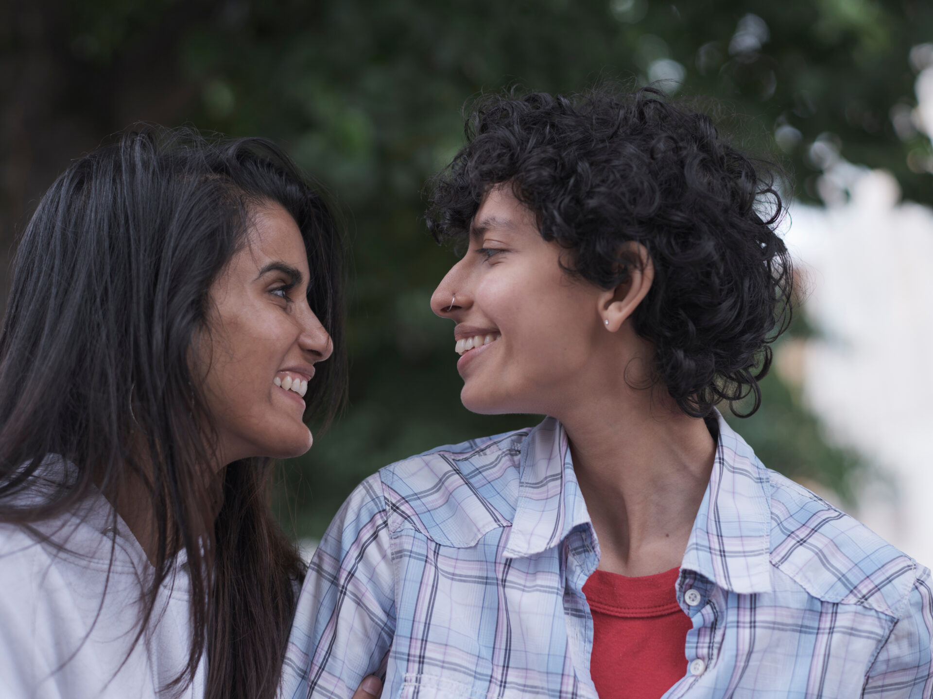 Smiling young female couple